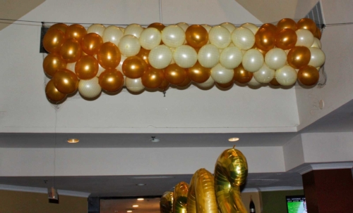 Gold and White Balloon Drop close-up