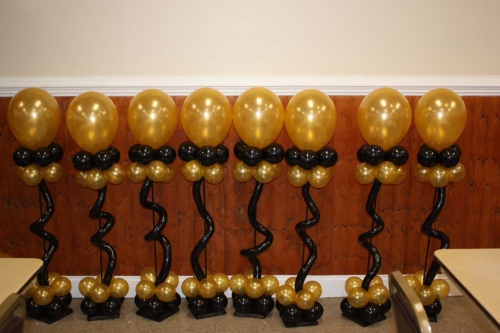 Black and Gold Centerpiece Decor with Curly Center