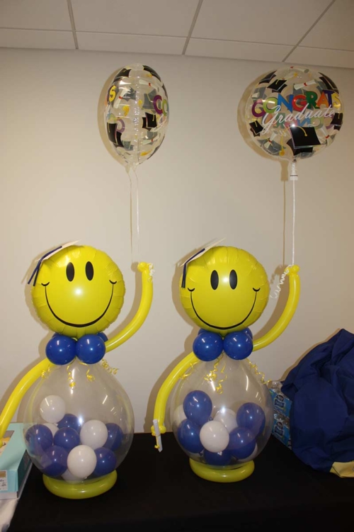 Smiley Face Centerpiece with Floating Grad