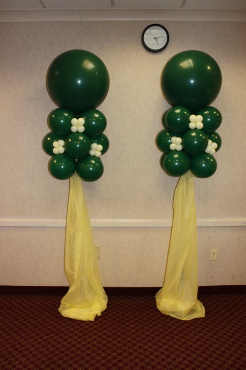 Green and Ivory Balloon Stands with A Touch of Flower