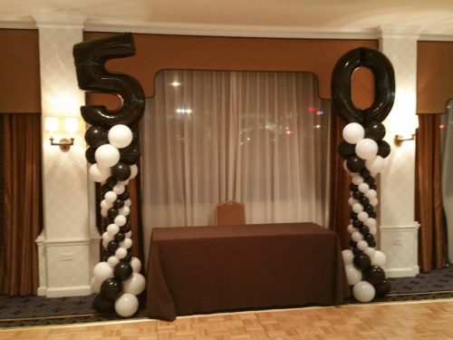 White and Black Columns with Number 50